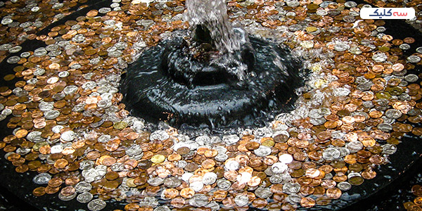 Throwing coins in the water features