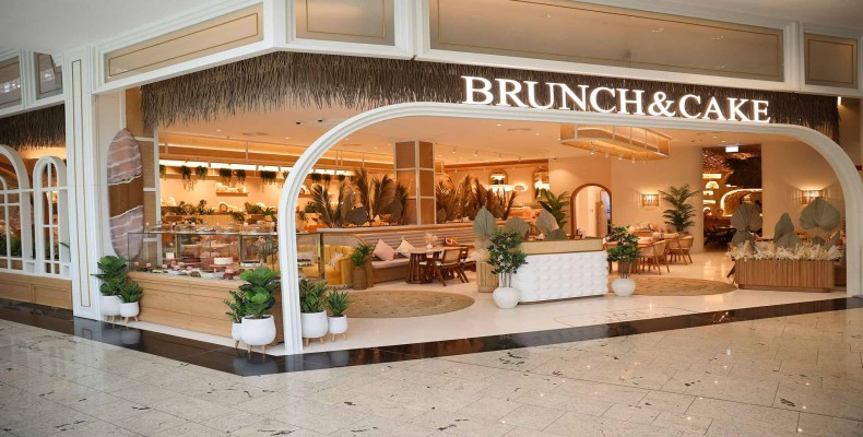 ورودی کافه برانچ اند کیک دبی با دکور گرم و طراحی الهامگرفته از بارسلونا