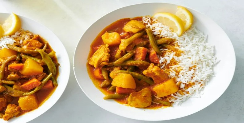 مرغ خورشتی و برنج جولوف در Papaye نیویورک