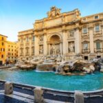 نمای شهر رم با گنبد کلیسای سنت پیتر و چشم‌انداز جاهای دیدنی رم در غروب