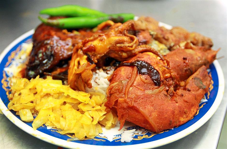 غذاهای سنتی مالزی؛ ناسی کندر